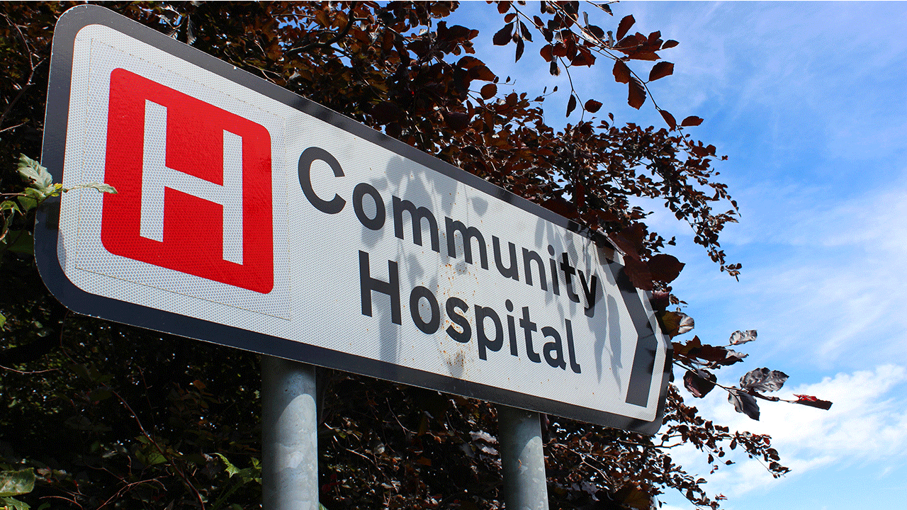 Sign directing to a community hospital