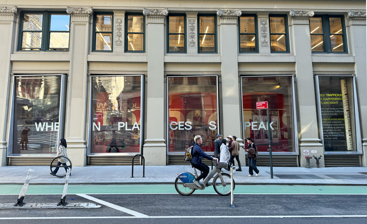 "When places speak" as text on a NYC building