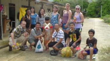 University of Minnesota, Morris, undergraduate Keyah Stone (third from left, back row) and other student researchers interact with community members in Sri Aman, an Iban community in Sarawak, Malaysia