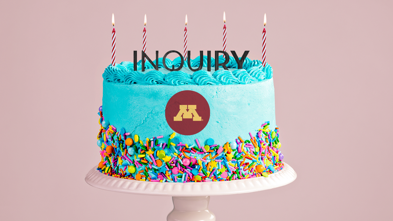 Birthday cake with the word "Inquiry" atop