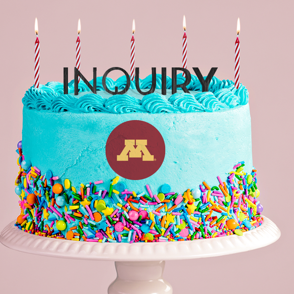 Birthday cake with the word "Inquiry" atop